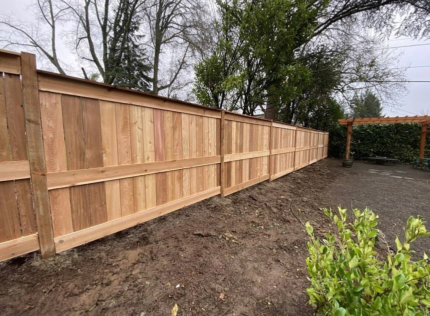 Cedar privacy fence install — fresh build