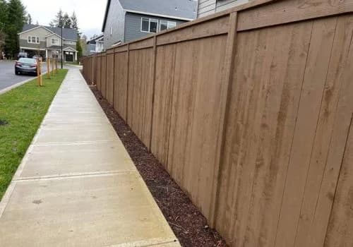 Wood fence install on a residential property